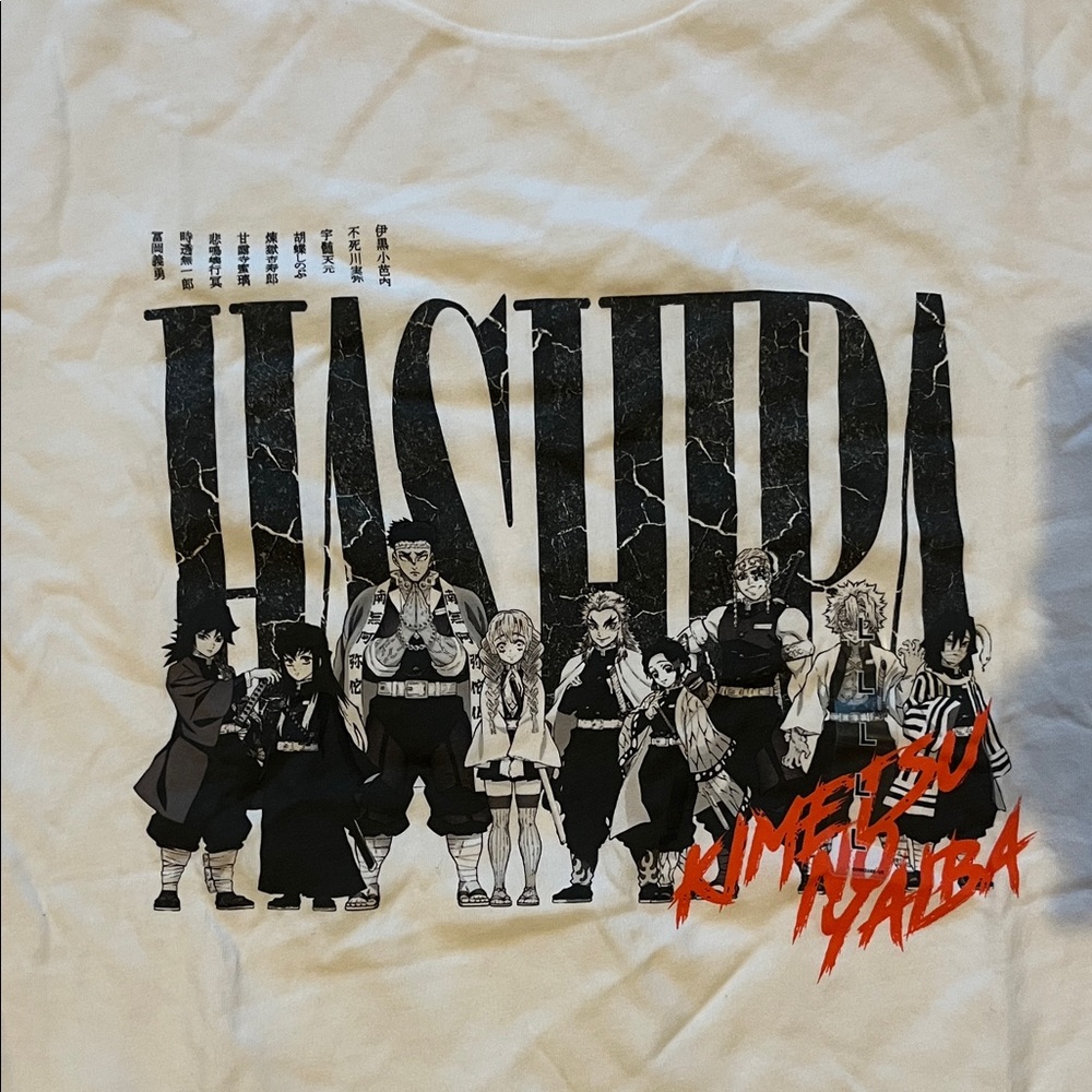 Uniqlo White Graphic Tee with Black and Red Design